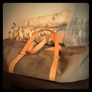 Lois Vuitton travel bag